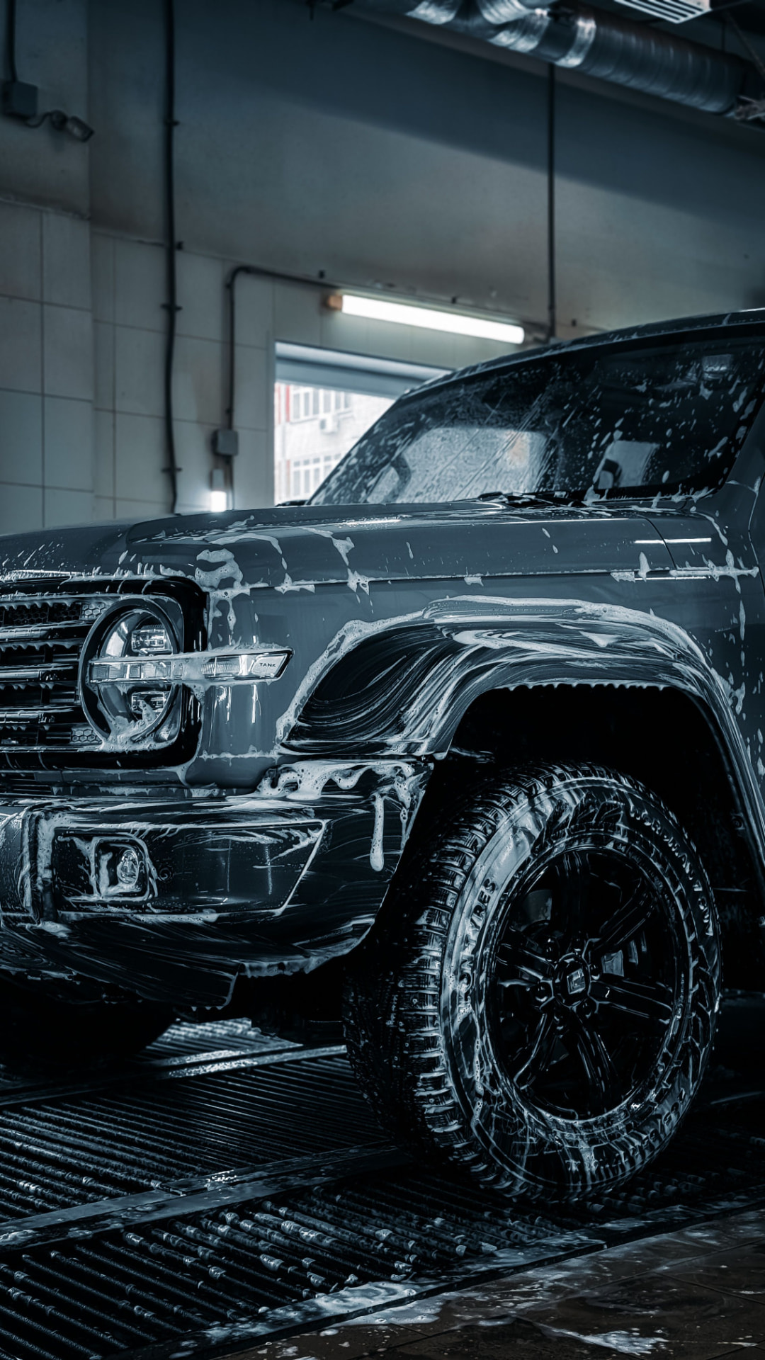 Fleet detailing service - work truck covered in foam during a wash