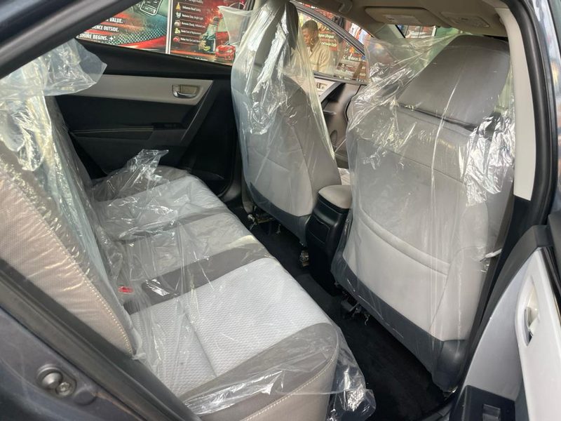 Rear seats freshly detailed with protective covers fitted after cleaning