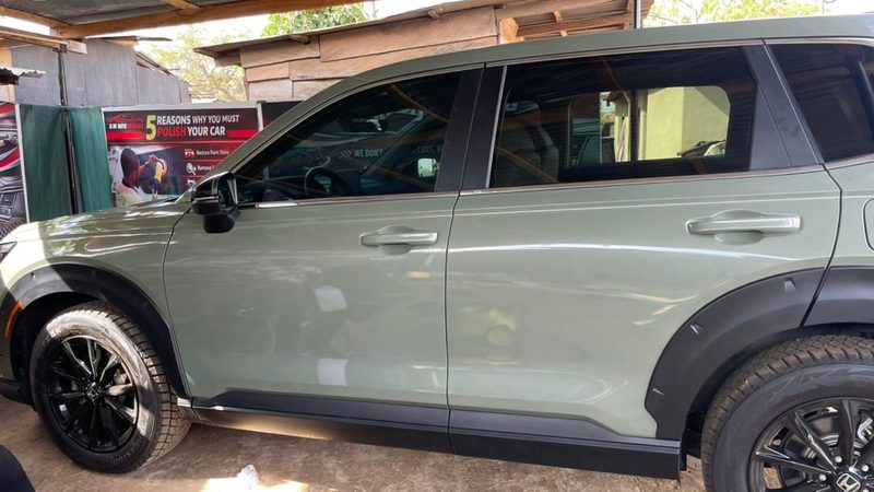 Green Honda Pilot with deep gloss finish after a full exterior detail